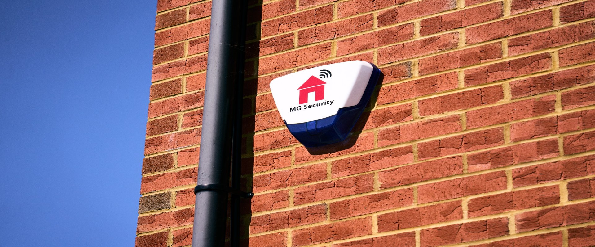 MG Security external alarm system installation on home